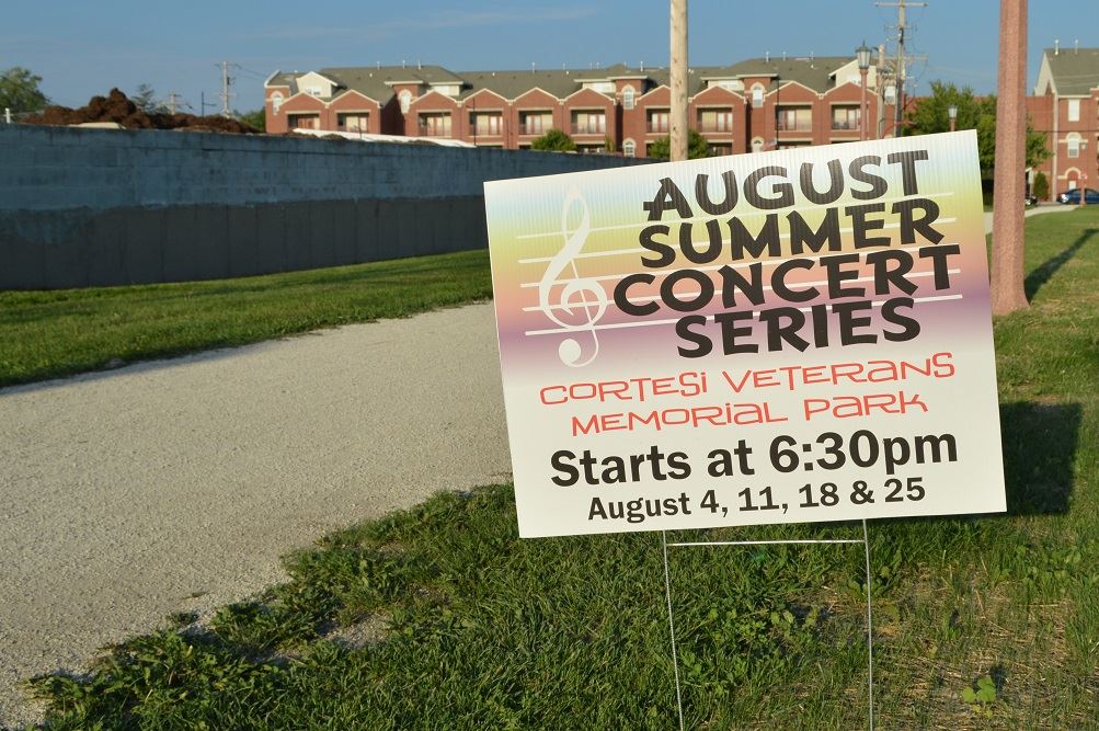 Community members sit on blankets and chairs at Cortesi Veterans Memorial Park to watch Mr. Meyers band perform Aug. 4, 2016.